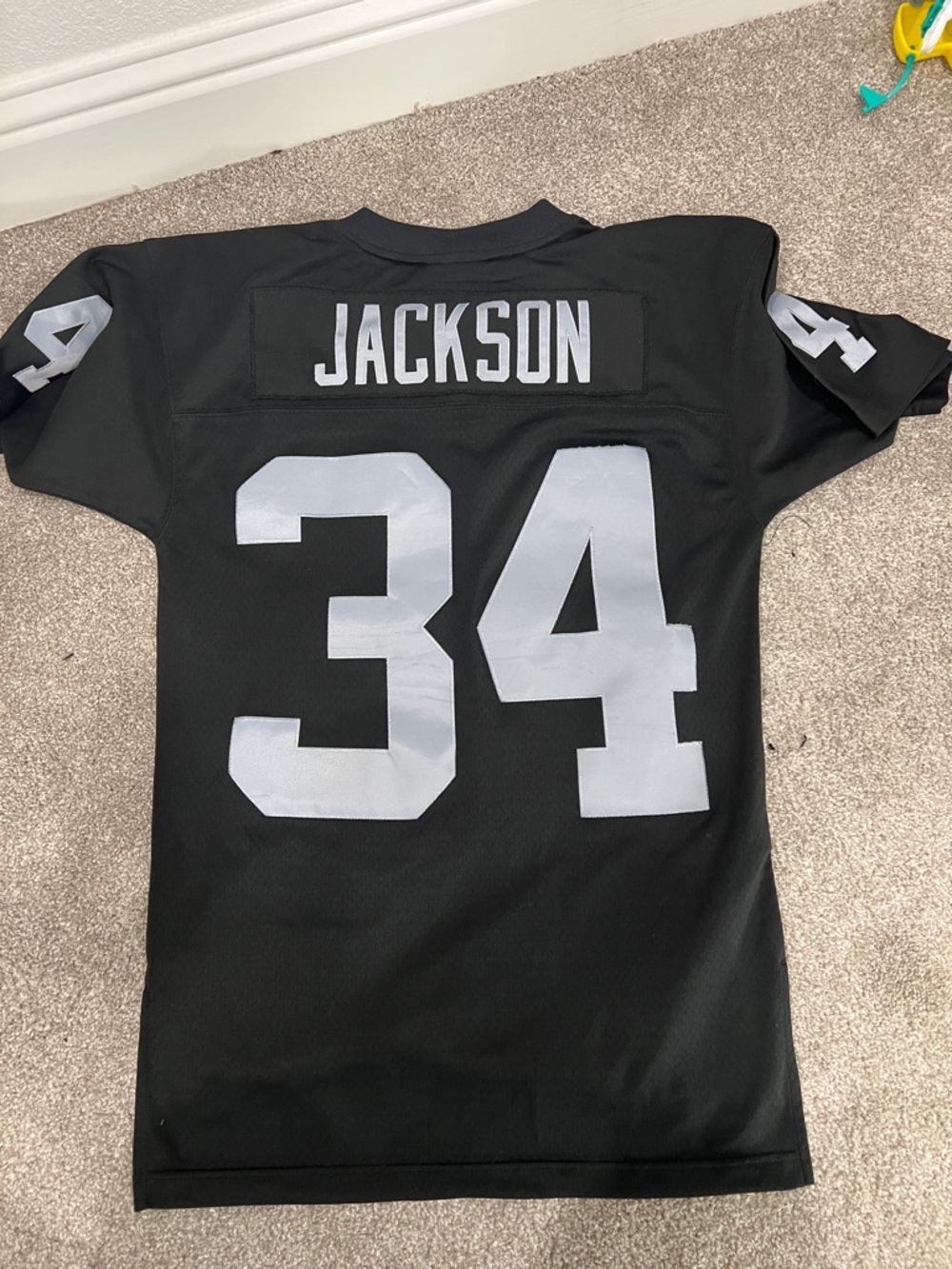 Mitchell & Ness Black Jersey with Silver #34